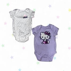 Two purple hello kitty onesies